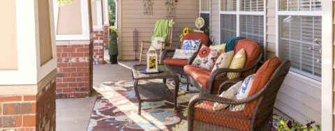 Sip on your favorite drink on the porch at Bickford of Omaha Hickory