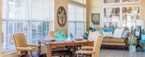 Enjoy the view of the outdoors from the sunroom at Bickford of Ames