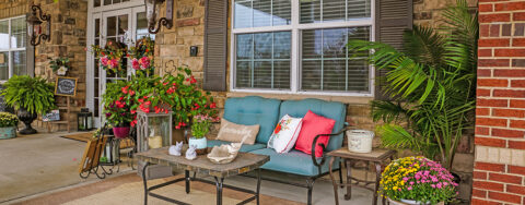 Relax in your favorite chair on the porch at Bickford of Aurora