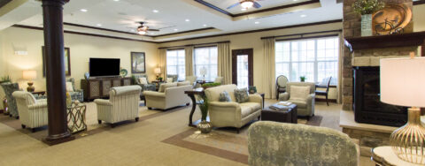Socialize with friends in the living room at Bickford of Aurora