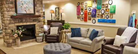Residents can enjoy furniture covered in cozy fabrics in the Mary B’s living room at Bickford of Aurora