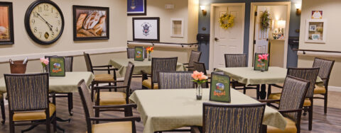 Residents with dementia receive additional assistance with meals in our Mary B’s dining room at Bickford of Aurora