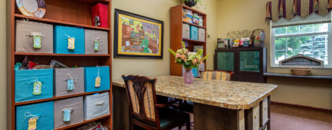 Relax with a good puzzle in the activity room at Bickford of Battle Creek