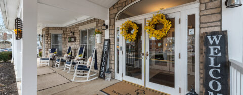 Enjoy conversations with friends on the porch at Bickford of Bexley