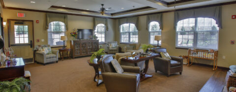 Residents can enjoy furniture covered in cozy fabrics in the Mary B’s living room at Bickford of Bloomington