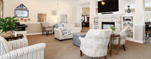 Enjoy a good book in the living room at Bickford of Champaign