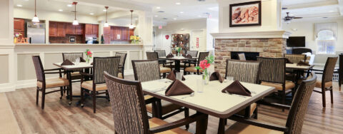 Residents with dementia receive additional assistance with meals in our Mary B’s dining room at Bickford of Champaign