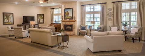 Enjoy a good book in the living room at Bickford of Clinton