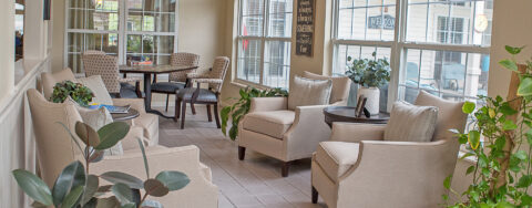 Relax in the warmth of the sunroom at Bickford of Clinton