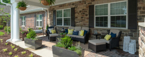 Sip on your favorite drink on the porch at Bickford of Chesapeake