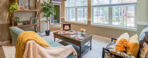 Curl up with a good book in the sunroom at Bickford of Chesapeake