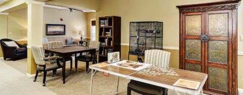 Relax with a good puzzle in the activity room at Bickford of Crystal Lake