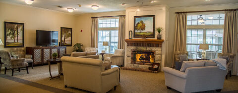 Socialize with friends in the living room at Bickford of Davenport