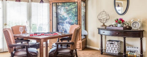 Enjoy a good card game with friends in the activity room at Bickford of Fort Dodge