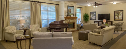 Enjoy a good book in the living room at Bickford of Iowa City