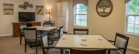 Relax with a good puzzle in the activity room at Bickford of Iowa City