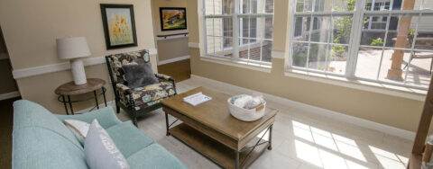 Enjoy the view of the outdoors from the sunroom at Bickford of Midland