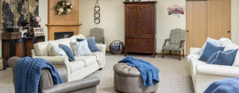 Chairs and sofas sit higher and are easier to get in and out of in the Mary B’s living room at Bickford of Middletown