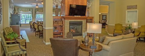 Snooze in your favorite chair in the living room at Bickford of Moline