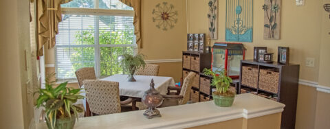 Relax in the warmth of the sunroom at Bickford of Moline