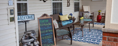 Sip on your favorite drink on the porch at Bickford of Marion