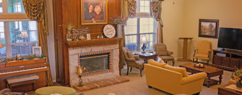 Socialize with friends in the living room at Bickford of Marion