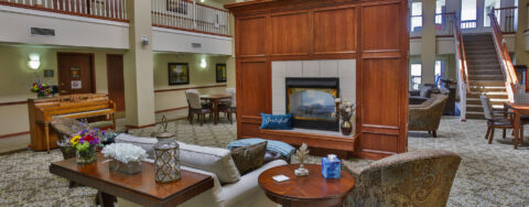 Socialize with friends in the living room at Bickford of Peoria