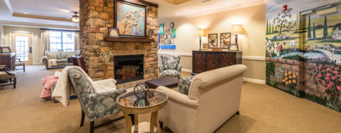 Chairs and sofas sit higher and are easier to get in and out of in the Mary B’s living room at Bickford of Shelby Township