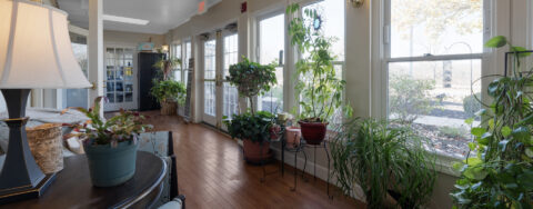 Relax in the warmth of the sunroom at Bickford of Upper Arlington