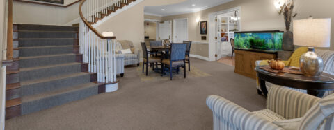 Socialize with a good friend in the sitting area at Bickford of Upper Arlington