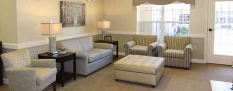 Enjoy a good book in the sitting area at Bickford of Tinley Park