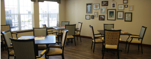 Enjoy a good card game with friends in the activity room at Bickford of Tinley Park