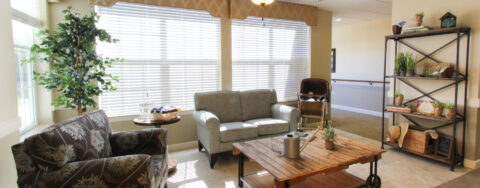 Enjoy the view of the outdoors from the sunroom at Bickford of Tinley Park