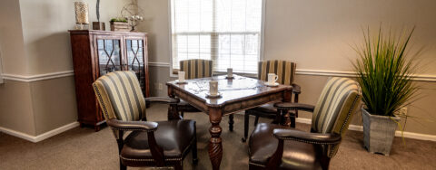 Relax with a good puzzle in the activity room at Bickford of Urbandale