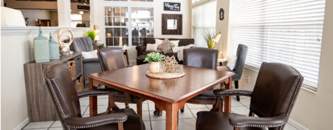 Curl up with a good book in the sunroom at Bickford of Urbandale